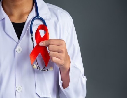 6454d4bcc00380doctor-holds-red-ribbon-hiv-awareness-awareness-world-aids-day-world-sexual-health-day_1150-24397.jpg